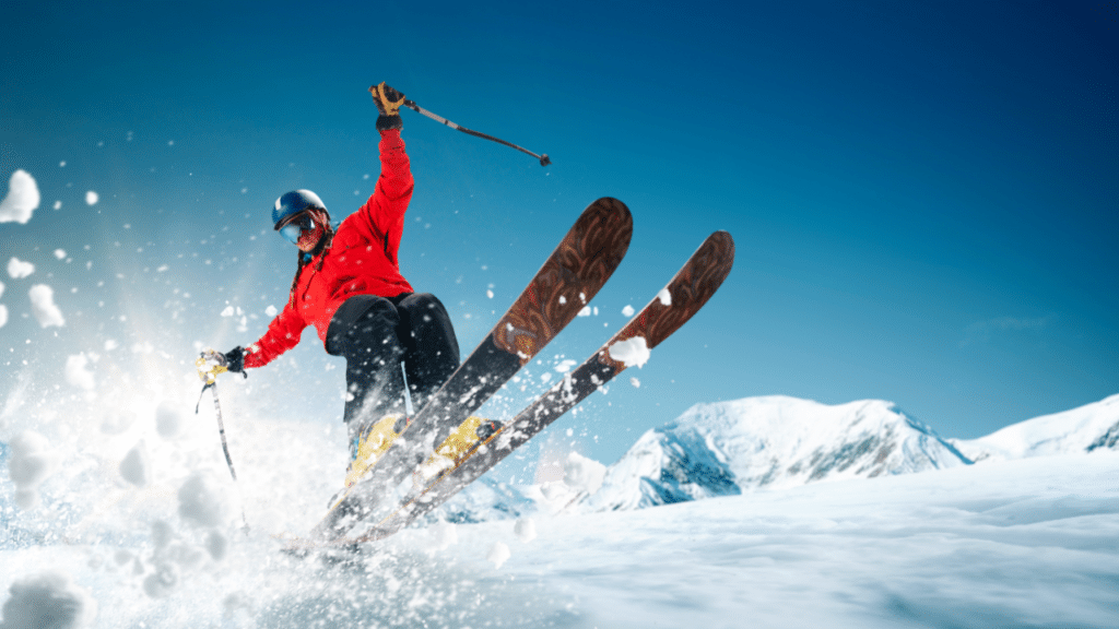 Skier headed down the slopes before experience The Most Common Ski Injuries