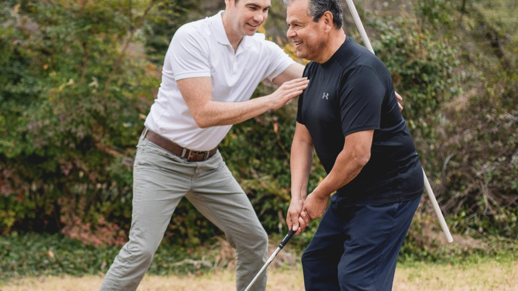 Founder Eric Finger helps patient on the golf course to show him how Therapeutic Exercises Physical Therapists Use to Help You Heal at Home