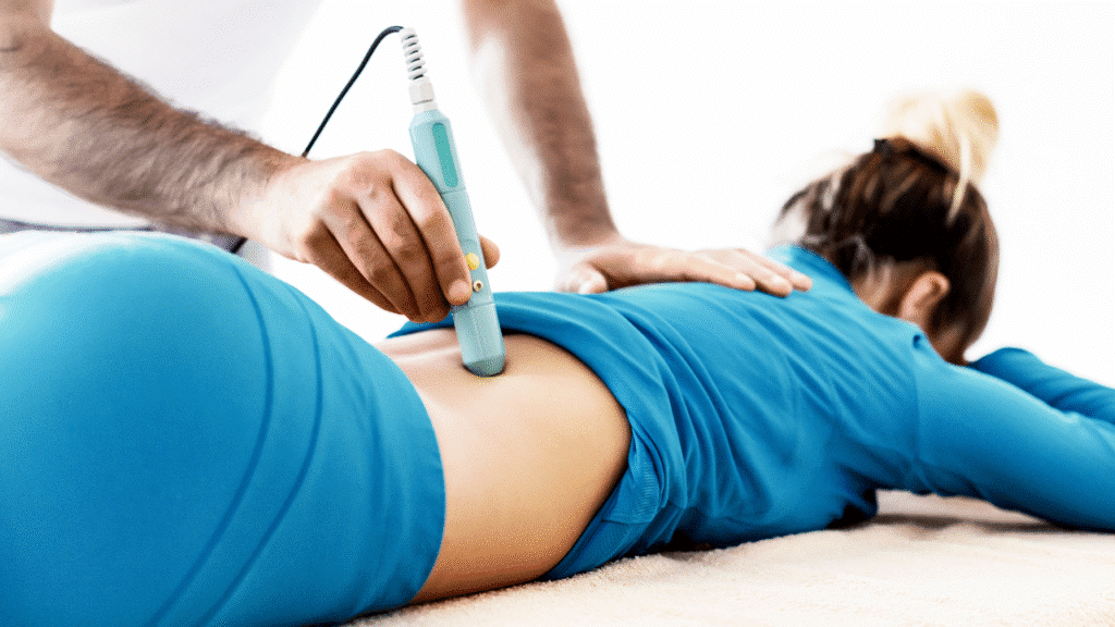 Physical therapist in Austin Texas is giving Cold Laser Therapy to female patient as a Healing Shortcut for their Active Lifestyle Needs