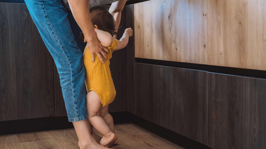 A parent who knows Why Women’s Pain Is Different Than Men’s And Should Be Treated Differently In PT holds their child in Austin Texas