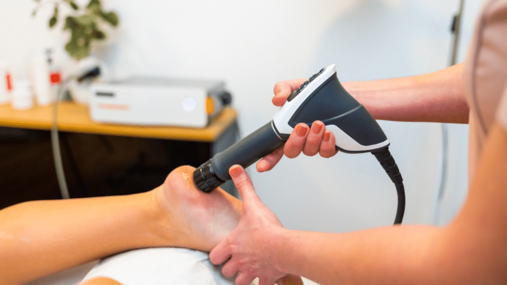 Texas PT uses shockwave therapy on patient's heel