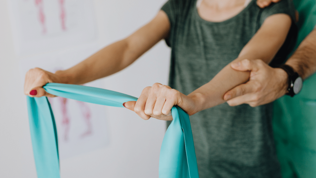 PT in Highland Park, TX works with a patient's arm strength as part of in-home physical therapy
